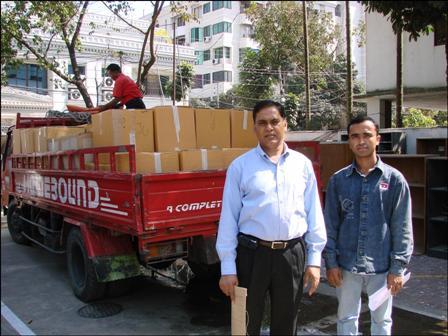Mr. Sakawat Hossain, President of Jahangirnagar University AAPG Student Chapter is receiving 52 boxes books from Dr. A. H. M (Shams) Shamsuddin, Chief Exploration Geologist, Chevron Bangladesh and Sponsor, Bangladesh AAPG Student Chapters